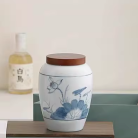 -hu-dung-tra-gom-su-canh-duc-trang-men-ve-tay-hoa-sen-th16